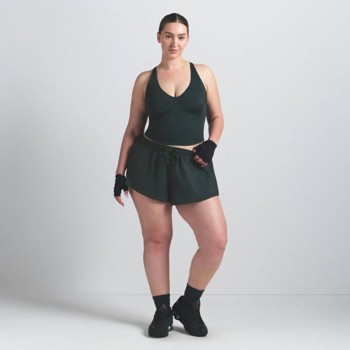 Φανέλα NikeSKIMS SHINE με V-NECK Φανέλα NikeSKIMS SHINE με V-NECK