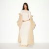 Μακρύ παλτό με τεχνητή γούνα και oversized σχέδιο Μακρύ παλτό με τεχνητή γούνα και oversized σχέδιο