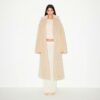 Μακρύ παλτό με τεχνητή γούνα και oversized σχέδιο Μακρύ παλτό με τεχνητή γούνα και oversized σχέδιο
